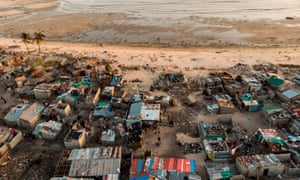 FILES-MOZAMBIQUE-CLIMATE-ENVIRONMENT-WEATHER-BEIRA-CYCLONE(FILES) In this file photo taken on April 01, 2019 debris and destroyed buildings which stood in the path of Cyclone Idai can be seen in this aerial photograph over the Praia Nova neighbourhood in Beira. - Daviz Simango, mayor of Beira on the Mozambican coast, had worked hard to shore up the city’s climate defences, drawing on World Bank help to build deterrents against rising seas, flooding and storms. But in just a few hours last month, Cyclone Idai devastated the city of half-a-million people and wiped out his efforts. (Photo by Guillem Sartorio / AFP)GUILLEM SARTORIO/AFP/Getty Images