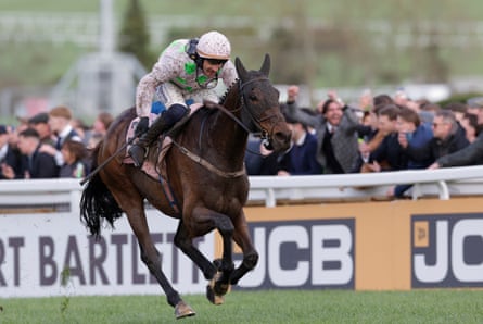 Paul Townend on Gaelic Warrior power up the hill to the finish line to win the Gold Cup.