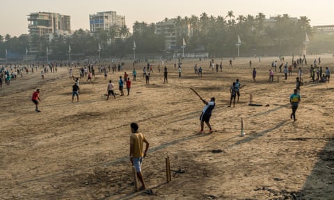 Hundreds of players taking part in cricket matches on Juhu beach in Mumbai on the shores of the Arabian Sea on a Sunday morning