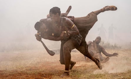 In The Woman King, wrestling with a male actor