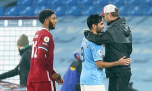 Jürgen Klopp embraces Ilkay Gündogan, who he managed at Borussia Dortmund.