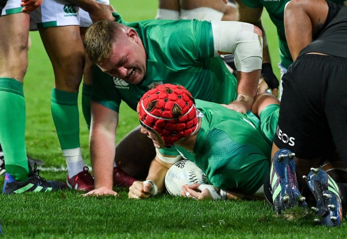 Josh van der Flier celebrates with teammate Tadhg Furlong.