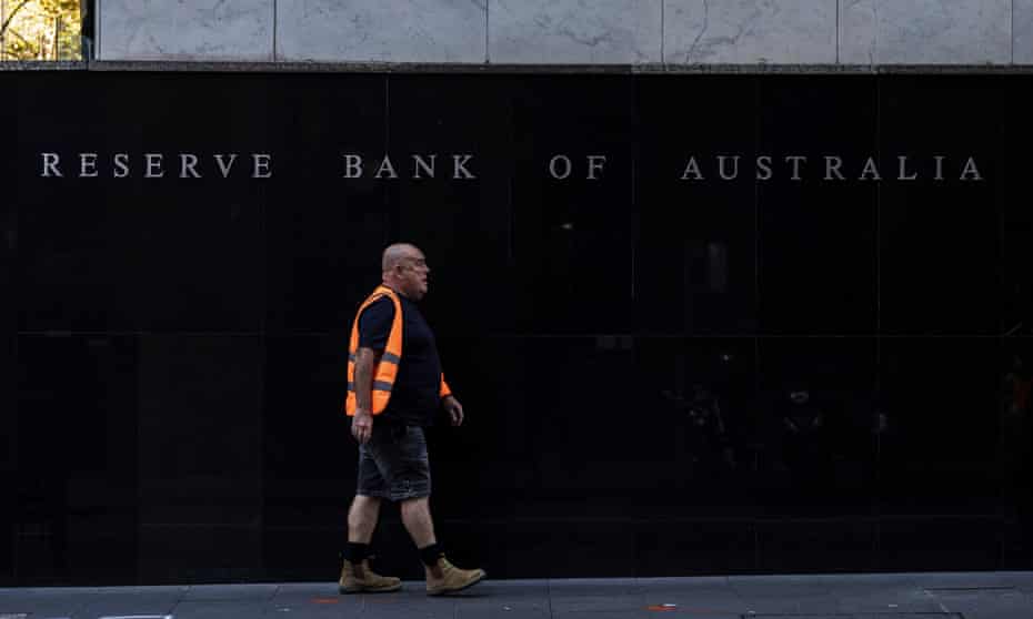 A pedestrian walks past the Reserve Bank of Australia building in Martin Place.