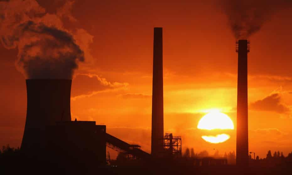 The sun sets behind the Tata Steel processing plant