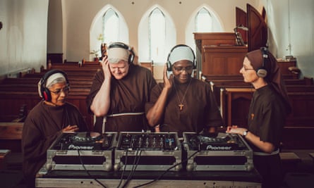 The sound of music: four of the Poor Clares of Arundel get to grips with the recording equipment.