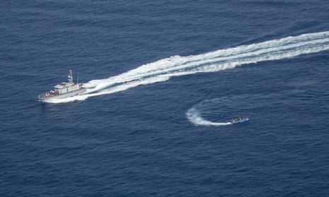 A picture taken on 30 June from the Sea-Watch plane. Libyan coastguards threw objects at the migrant boat and pulled a rope with a buoy behind it to ‘catch’ it as well as firing and trying to ram it, Sea-Watch said