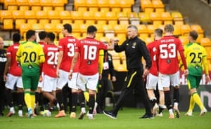 Manager Ole Gunnar Solskjaer celebrates with his players at full time.