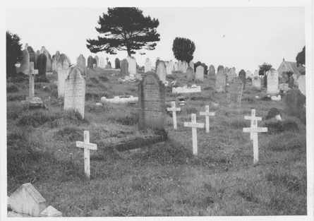 Six white wooden crosses mark the graves of German airmen buried in Plymouth’s Ford Park Cemetery