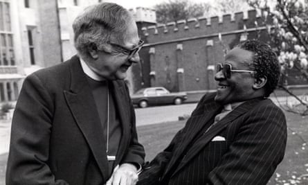 The Archbishop of Canterbury Robert Runcie shares a joke with Bishop Desmond Tutu at Lambeth Palace in 1981.