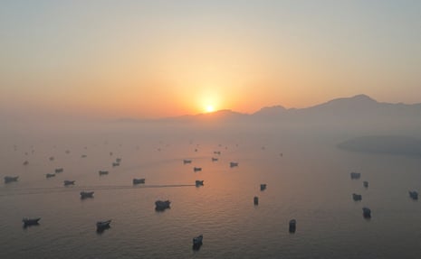 A drone view showing dozens of ships stranded at sea in the strait of Hormuz.