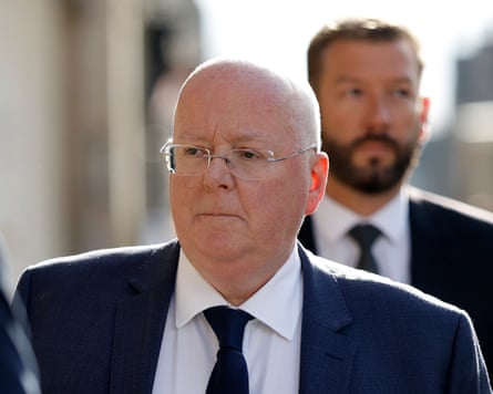 Peter Murrell wearing a suit.