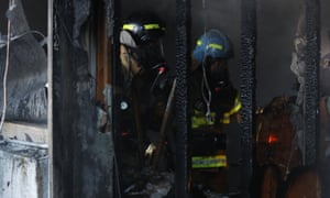 Firefighter at the scene of a fire at a hospital in Miryang, South Korea.