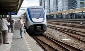 Intercity train arriving at Leiden
        Central railway station, Netherlands.