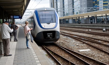 Intercity train arriving at Leiden Central railway station, Netherlands.