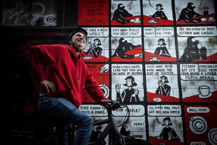 James Norman takes a pause by a street artwork by Fikaris and Niqui Toldi in Collingwood.