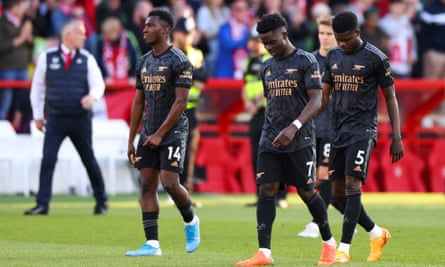 Eddie Nketiah, Bukayo Saka and Thomas Partey of Arsenal look dejected.