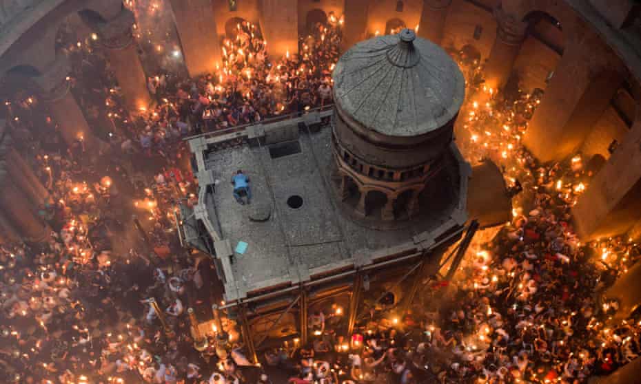 Orthodox Christian worshippers at the Tomb of Christ during the miracle of the Holy Fire in the Church of the Holy Sepulchre, Jerusalem. David Lowenthal cited the church as an example of how different cultures imagine their own heritage. 
