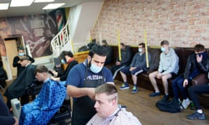 People get their hair cut at the Unique Traditional barber’s in Whitley Bay today.