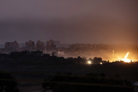 Smoke rises in Gaza on Sunday as Israeli airstrikes continue.