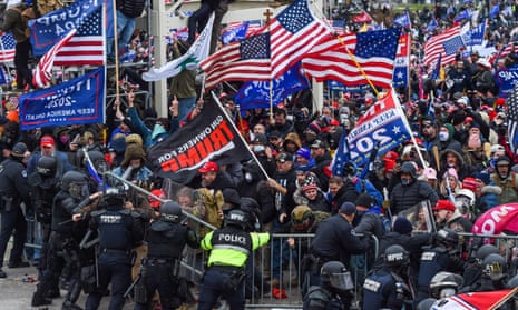 Trump supporters clash with police and security forces as they storm the US Capitol in Washington, DC on 6 January 2021.