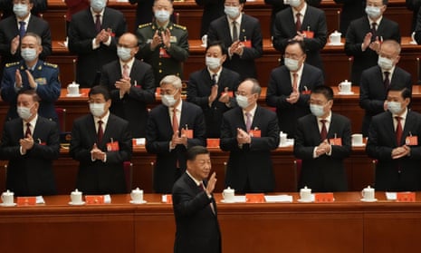 Xi Jinping waves as he arrives for the opening of the Communist party congress