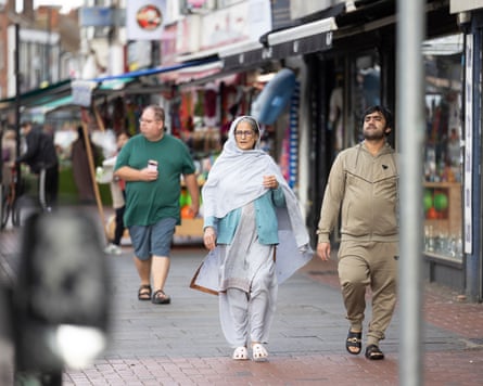 Members of the Asian community on a shopping street