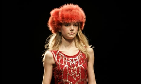 A model wears a fur hat on the catwalk during a previous London fashion week.