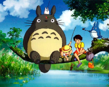 still from My Neighbour Totoro - two girls sit on a tree branch to fish in a stream, with totoro and another spirit beside them