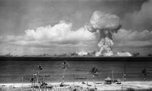 A mushroom cloud forms after an atomic bomb is tested off the coast of Bikini Atoll, Marshall Islands, July 1946.