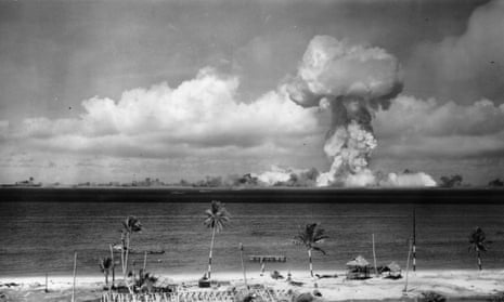A mushroom cloud forms after a test explosion off the coast of Bikini Atoll, Marshall Islands, in 1946.