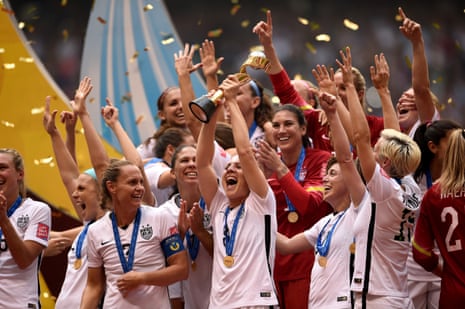 USA lift the World Cup trophy.