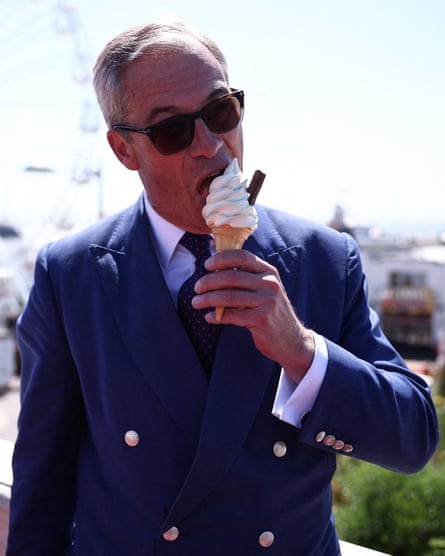 Nigel Farage, in a double-breasted suit and sunglasses, licks at Cadburys 99 flake ice cream in front of a ferris wheel