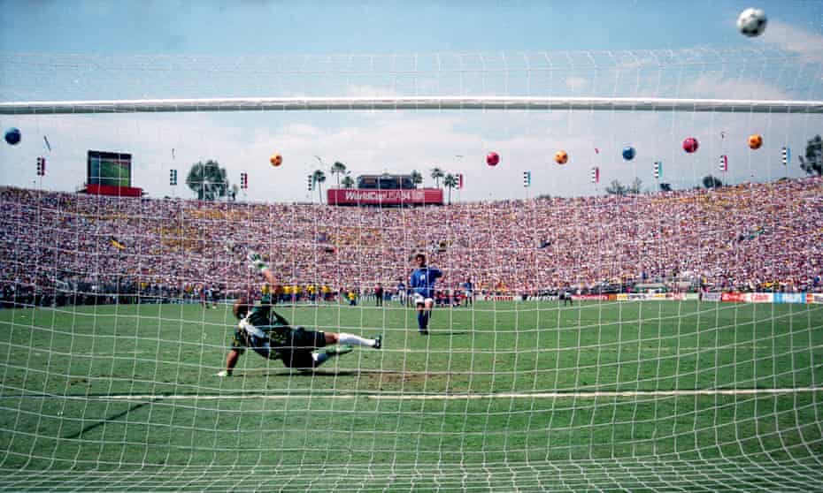Italy’s Roberto Baggio sends the ball high over the crossbar and the head of Brazilian goalkeeper Claudio Tafarrel in the 1994 World Cup final. 