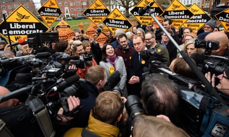 Sarah Olney and Lib Dem leader Tim Farron surrounded by journalists after her byelection win