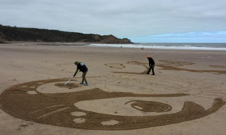 The 50-metre sand drawing being created by Sand In Your Eye for Surfers Against Sewage’s new Million Mile Beach Clean campaign, on Cayton Bay in Yorkshire. 