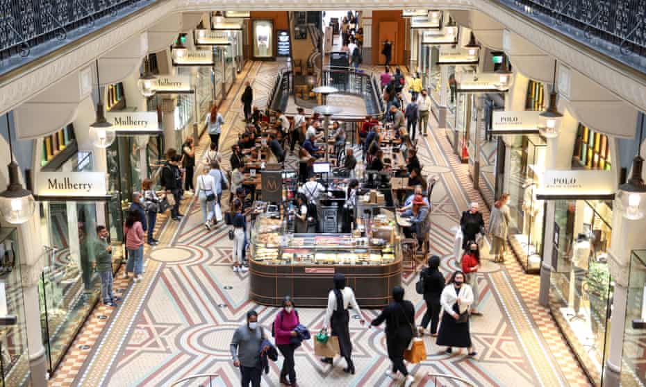 People shop and dine at cafes inside the Queen Victoria Building in Sydney in October 2021.