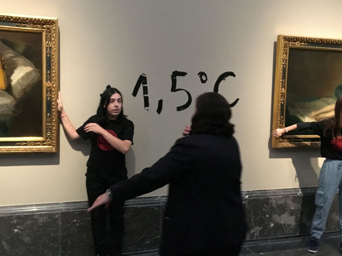 Climate activists glue themselves to frames of two Goya paintings