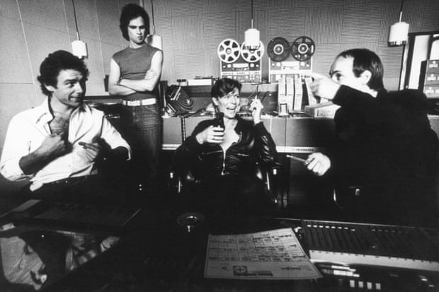 David Bowie at Hansa Tonstudio with Robert Fripp, left, and Brian Eno, right, in July 1977.