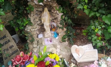 The statue of the Virgin Mary in the Gregori family’s front garden.