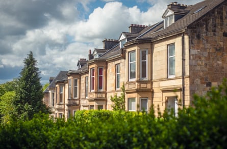 Sandstone terrace houses on a leafy street in the Southside of Glasgow