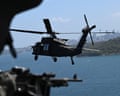 One of the Australian defence force’s new UH-60M Black Hawk helicopters flies over Sydney Harbour