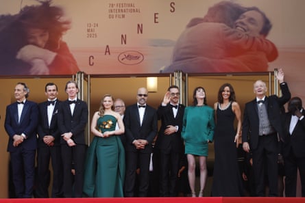 Alexandre Desplat, Rupert Friend, Wes Anderson, Mia Threapleton, Jeffrey Wright, Benedict Cumberbatch, Charlotte Gainsbourg, Antonia Desplat and Bill Murray at the premiere of The Phoenician Scheme in Cannes.