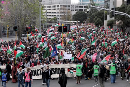 Thousands of pro-Palestine protesters march through the Auckland CBD on 13 September.