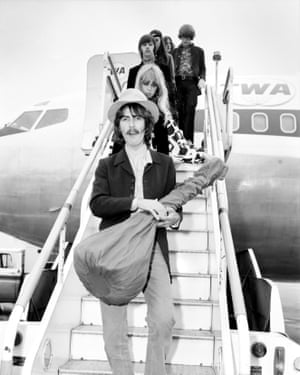George Harrison carrying his Hemen & Co sitar off the plane at Heathrow airport, June 1968.
