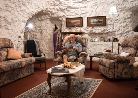 Bert Gale, 81, sits in his living room in his home on Turley’s Hill in White Cliffs, NSW, on 23 April 2021