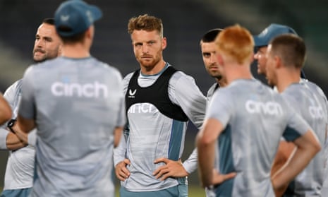 Jos Buttler with his England teammates in the nets in Karachi