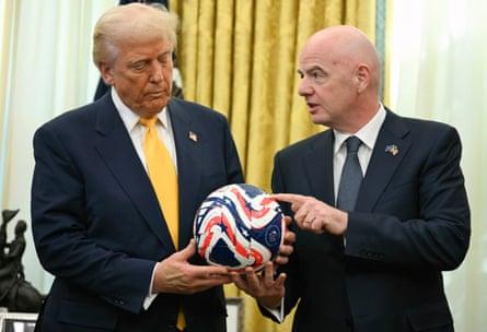 Gianni Infantino, right, presents President Donald Trump with the Club World Cup official ball in March