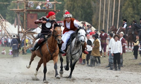 Artists perform during the second World Nomad Games at Issyk Kul lake in Cholpon-Ata, Kyrgyzstan.