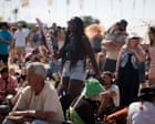 Sing along with the common people: Saturday at Glastonbury with Raye, Pulp and pop punters – photo essay