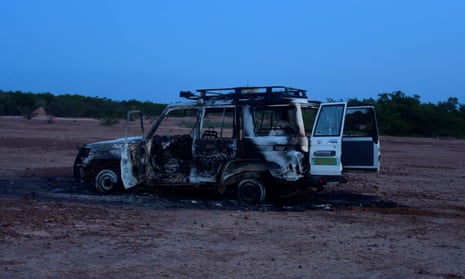 The wreckage of the Toyota 4x4 in which six French aid workers, their local guide and their driver were killed. 